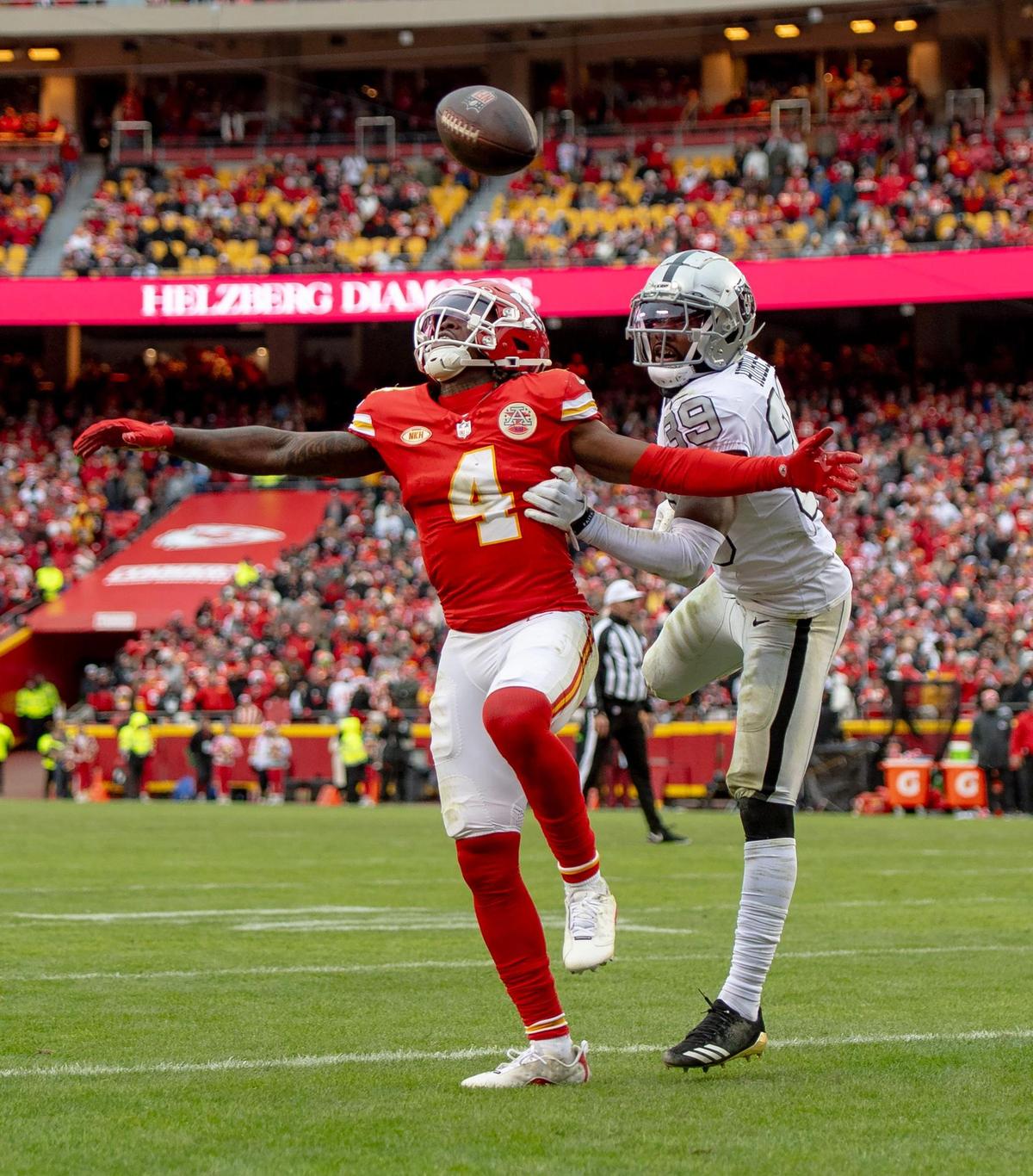 Las Vegas Raiders cornerback Nate Hobbs (39) breaks up a pass intended for Kansas City Chiefs wide receiver Rashee Rice (4) during an NFL football game on Monday, Dec. 25, 2023, at Arrowhead Stadium at GEHA Field in Kansas City.