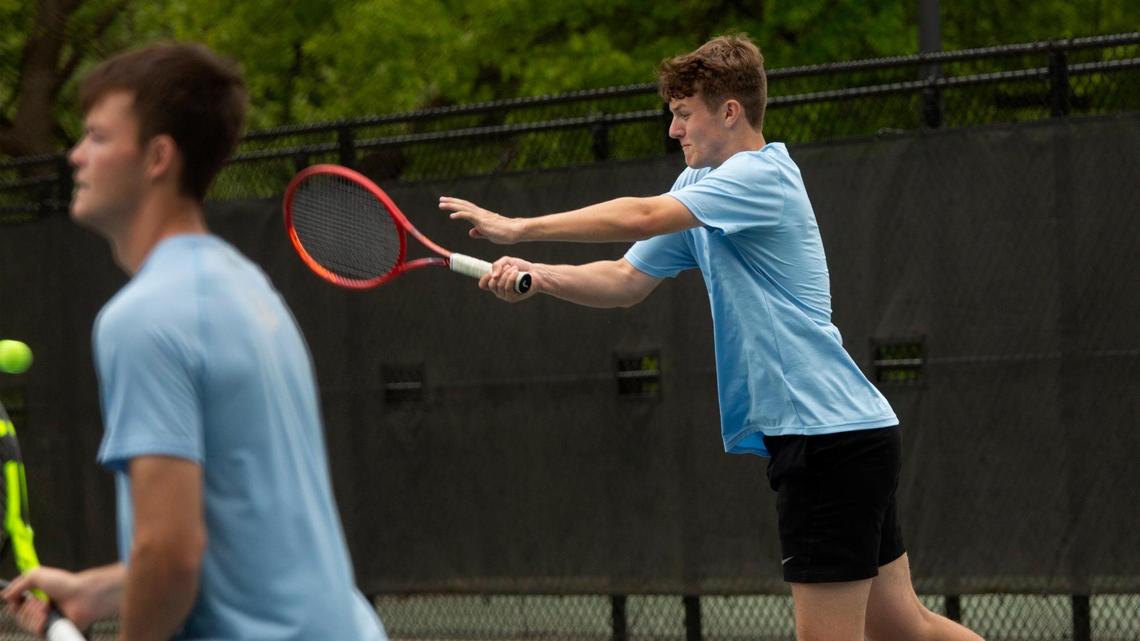 Ethan Olufson (right) of Shawnee Mission East and his partner Sam Freund competed in doubles in the high school state tennis championships, Friday, May 14,2021 at Shawnee Mission East high school.