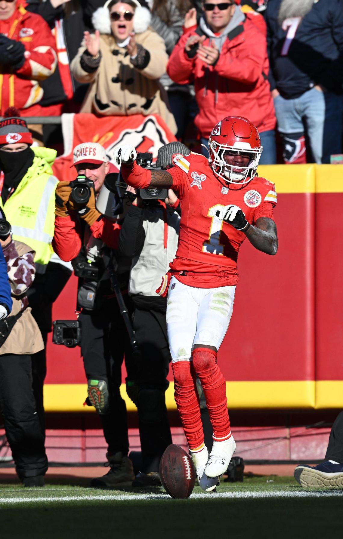 Kansas City Chiefs wide receiver Xavier Worthy (1) celebrates after scoring on the Houston Texans in the third quarter on Saturday Dec. 21, 2024, at GEHA Field at Arrowhead Stadium.