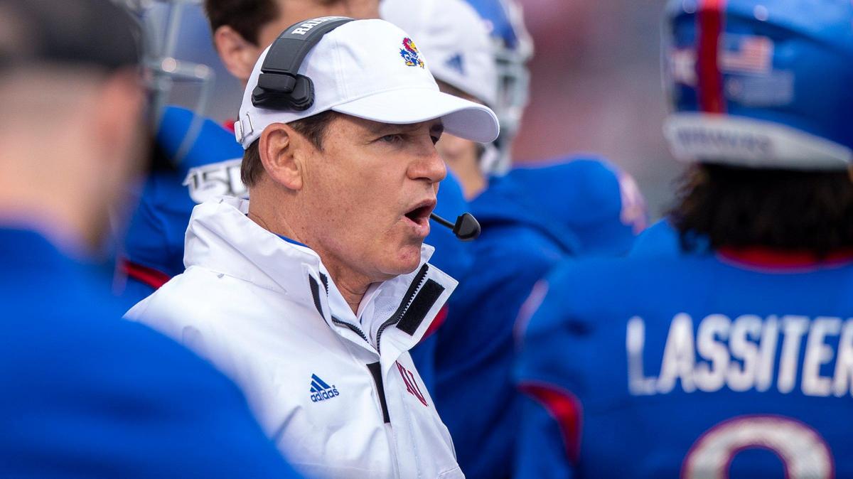 Kansas Jayhawks head coach Les Miles talks to players during a timeout in their game against Oklahoma Saturday, Oct. 5, 2019, at David Booth Kansas Memorial Stadium.