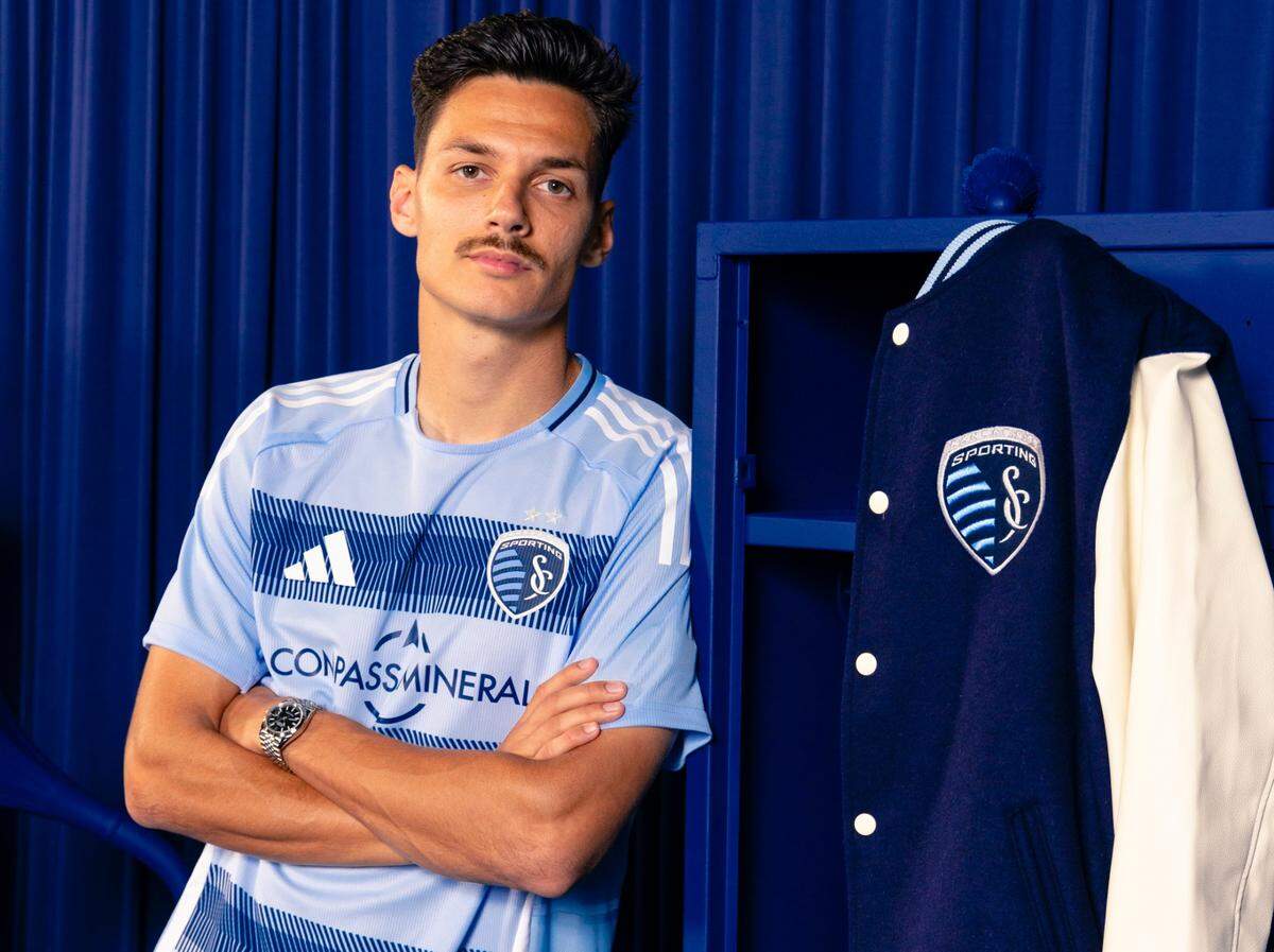 Sporting Kansas City winger Daniel Salloi models the club’s new primary “One KC” kit for the 2025 Major League Soccer season.