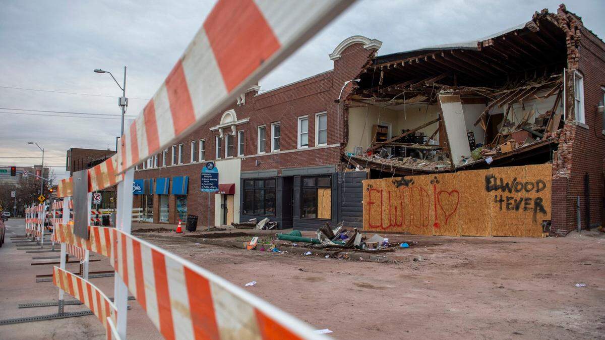 A partially collapsed building was seen Dec. 17, 2021, two days after a fire truck slammed into a car and then into the building. 