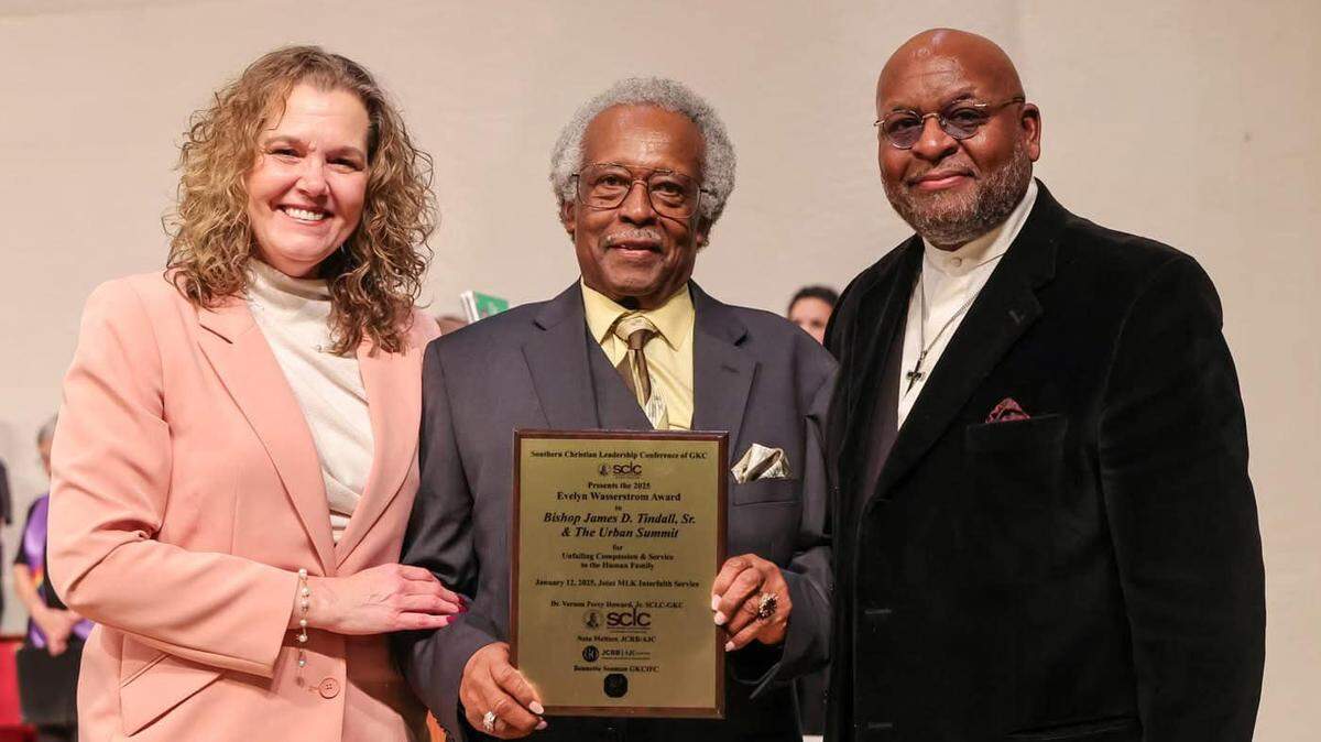 Bishop James Tindall, Sr., holds the 2025 Evelyn Wasserstrom Award, flanked by Bennette Seaman, Chair of GKCIFC (left) and Dr. Vernon Howard, SCLC-GKC President (right).
