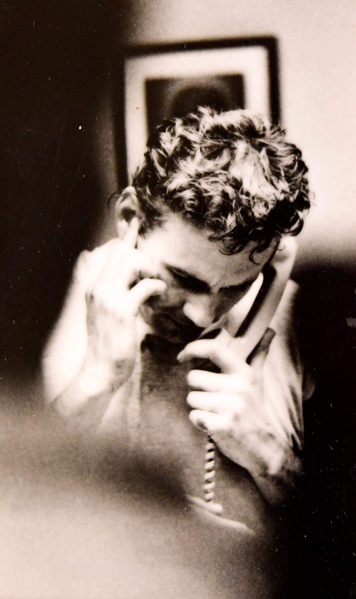 After wining the Super Bowl in 1970 against the Minnesota Vikings, Kansas City Chiefs quarterback Len Dawson takes a phone call from President Richard Nixon.