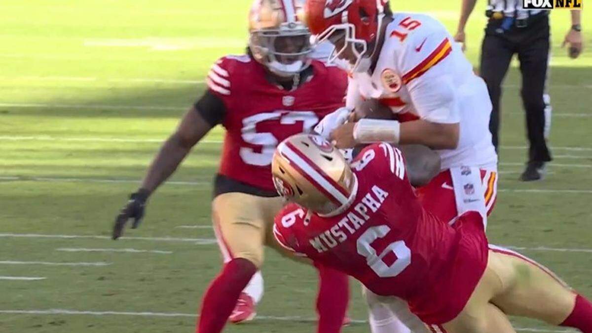 Chiefs quarterback Patrick Mahomes crushed the 49ers’ Malik Mustapha.