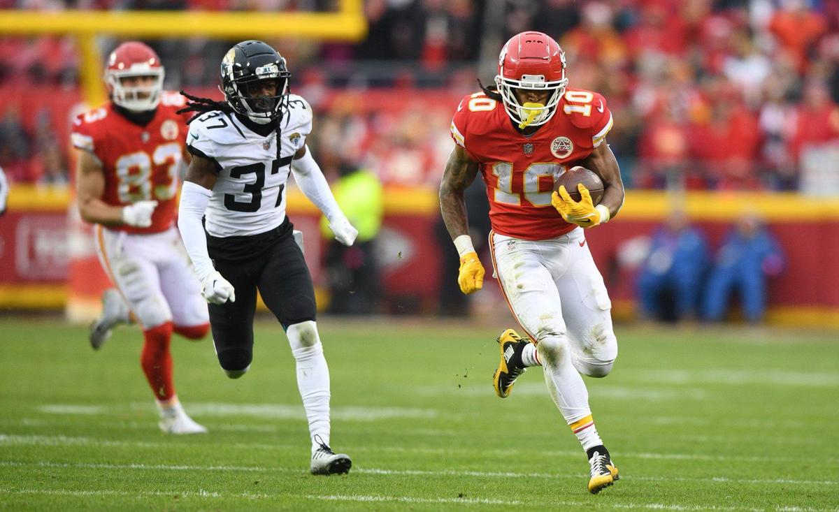 Kansas City Chiefs running back Isiah Pacheco runs for big yardage past the defense of Jacksonville Jaguars cornerback Tre Herndon in the second quarter during the Divisional Round game Saturday, Jan. 21, 2023 at Arrowhead Stadium.