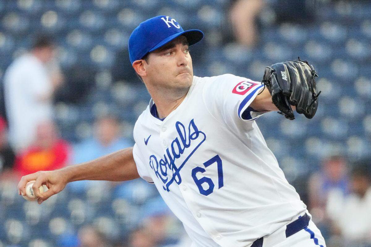 Kansas City Royals starting pitcher Seth Lugo (67) delivers a pitch against the Cleveland Guardians in the first inning at Kauffman Stadium.