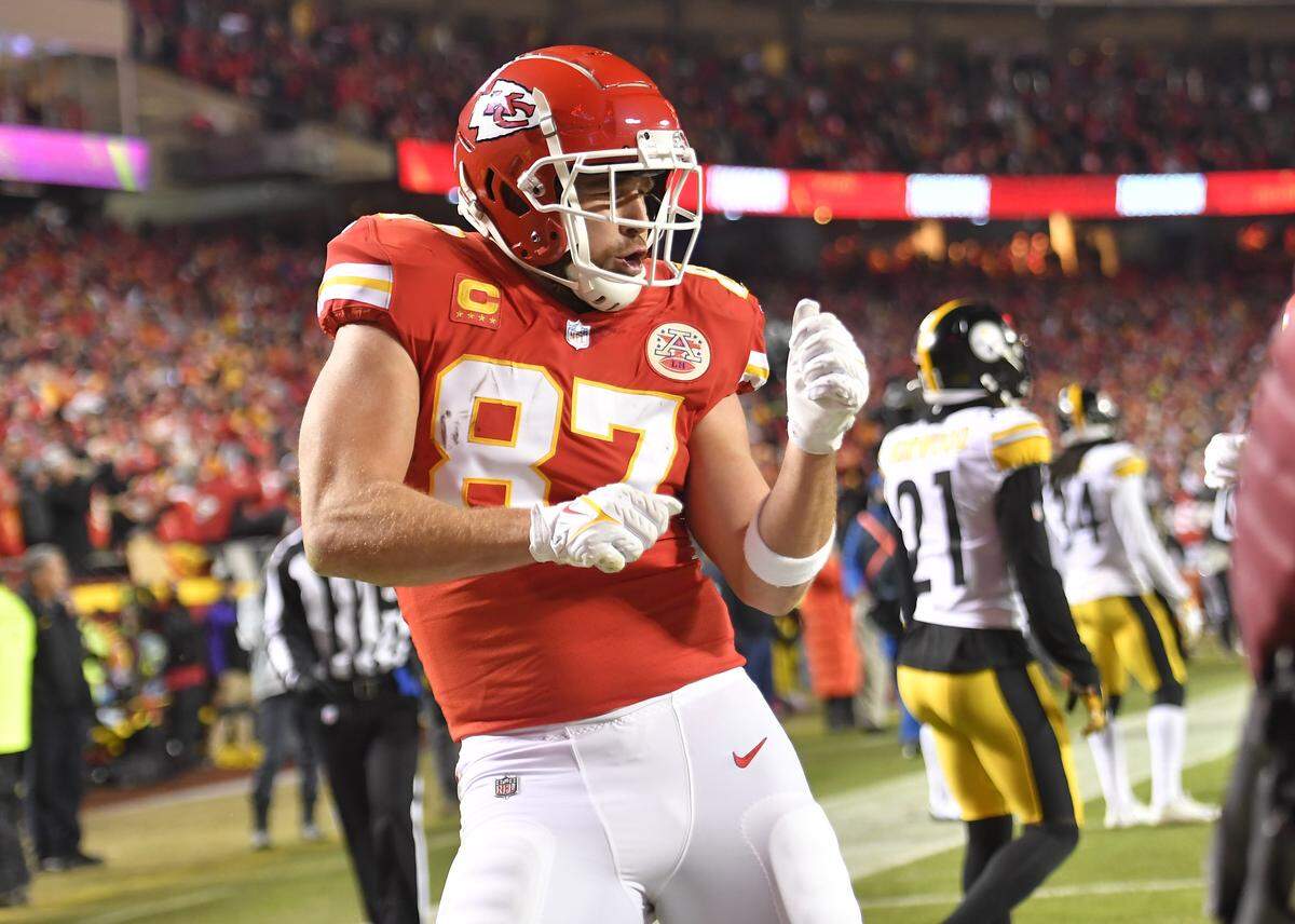 Kansas City Chiefs tight end Travis Kelce does a little jig after scoring a touchdown in the second quarter against the Pittsburgh Steelers in the AFC Wild Card game on January 16, 2022, at Arrowhead Stadium in Kansas City. 