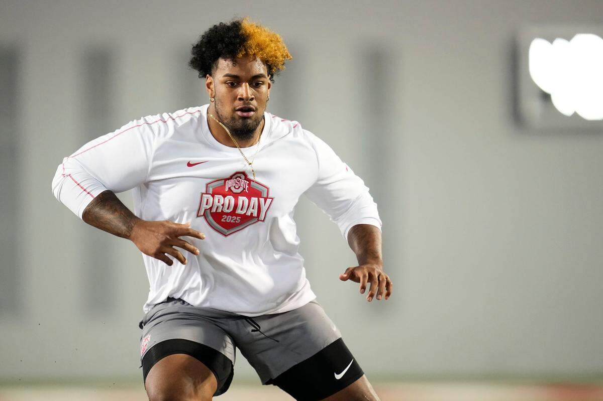 Ohio State Buckeyes offensive lineman Josh Simmons works out during the team’s pro day for NFL scouts at the Woody Hayes Athletic Center on March 26, 2025.