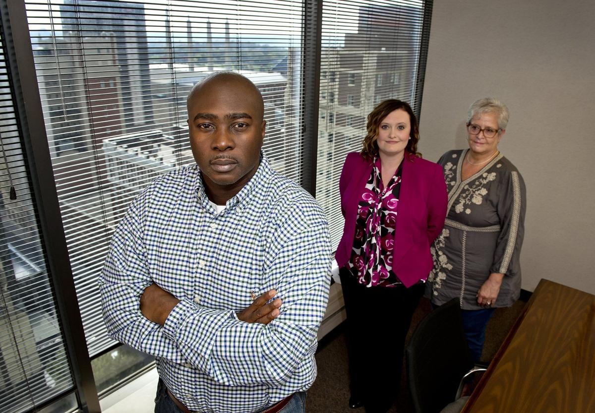 In 2017 Kansas City firefighter Tarshish Jones, with the help of attorneys Erin Vernon, center, and Lynne Bratcher, was awarded more than $350,000 in compensatory damages from a race discrimination lawsuit over promotions within the fire department.