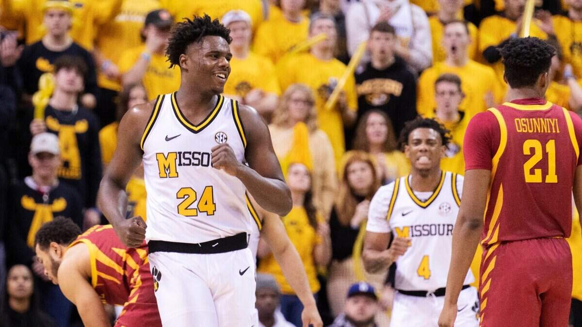 Missouri’s Kobe Brown smiles as he runs up the court during the second half of a win against Iowa State, Saturday, Jan. 28, 2023, in Columbia, Mo.