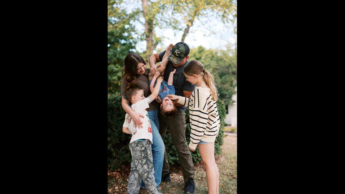 Kayleigh and Wes Wasmer’s family of four became five when they adopted Abbott (in the center). Abbott’s biological mother was homeless and was from the same small town where Kayleigh grew up. After her son was born in June 2023, she reached out to Kayleigh and asked if she and her husband would adopt him. The couple now advocate to get Safe Haven Baby Boxes in the Kansas City area to provide moms options when they can’t care for their newborns.