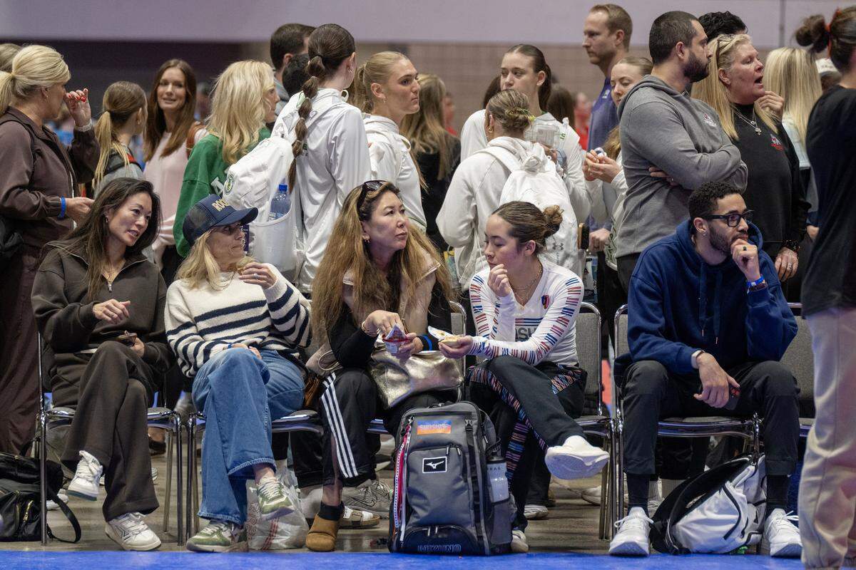 Spectators line the volleyball court at the Triple Crown Women's National Invitational Tournament (NIT) in Kansas City on Sunday, Feb. 15, 2026, at Bartle Hall at the Kansas City Convention Center. As one of the nation's premier youth volleyball events, this year's tournament drew 687 teams and roughly 40,000 attendees.