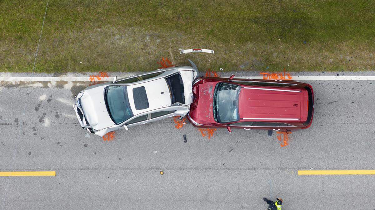 A survivor of a bike-car accident says in-car tech devices and programs like Kansas City’s Vision Zero program can help.