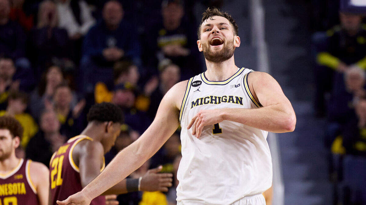 Michigan Wolverines center Hunter Dickinson (1) celebrates during the second half against the Minnesota Golden Gophers at Crisler Center in Ann Arbor, Michigan, on Jan. 22, 2023.