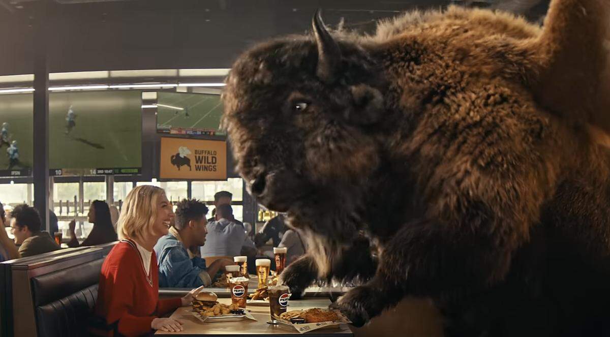 Heidi Gardner in her new Buffalo Wild Wings ad.