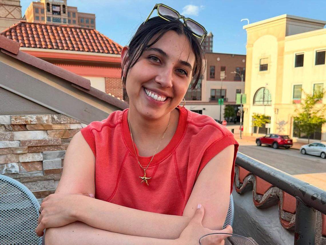 Isabela “Izzy” Estes smiles for a photo in Lawrence in July 2025.