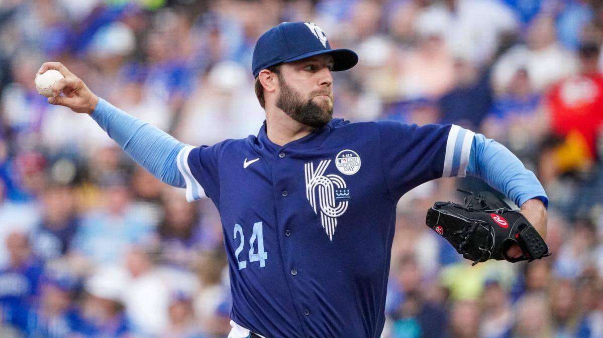 Kansas City Royals starting pitcher Jordan Lyles (24) delivers a pitch against the Colorado Rockies in the first inning at Kauffman Stadium on June 2, 2023.