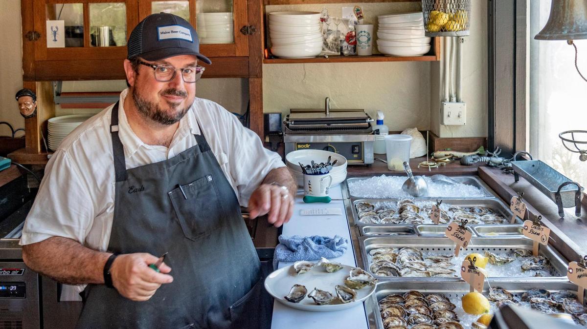 Co-owner Cory Dannehl preparing oysters at Earl’s Premier.