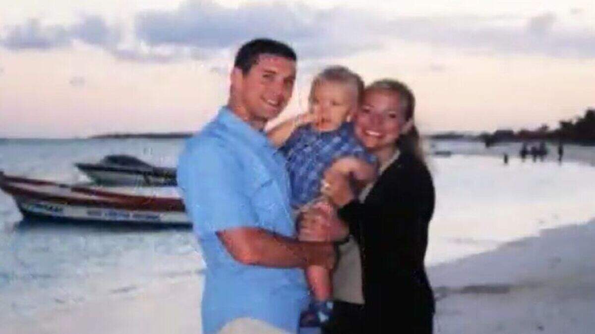 Screen shot from a YouTube video showing Justin and Trisha Buerge and their young son, Jaxon.