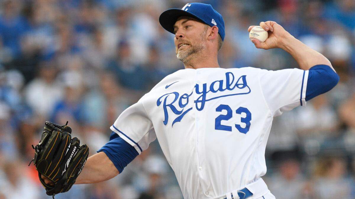 Kansas City Royals starting pitcher Mike Minor throws to a Detroit Tigers batter during the first inning of a baseball game in Kansas City, Mo., Tuesday, June 15, 2021. (AP Photo/Reed Hoffmann)