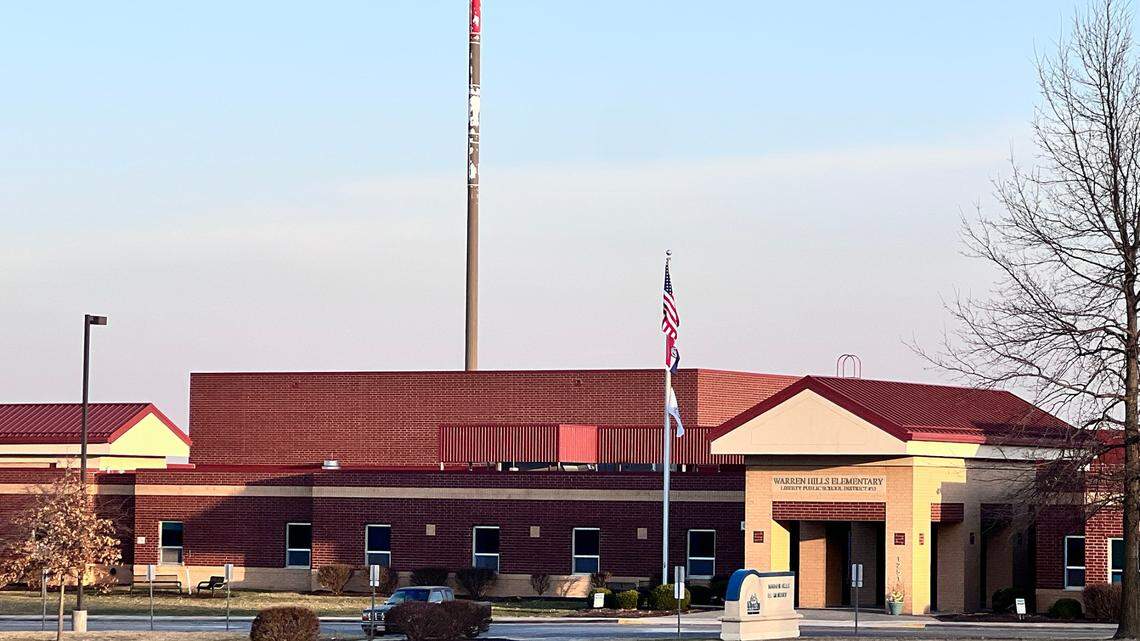 Warren Hills Elementary School in Liberty. A cellular antenna stands very close to the school building.