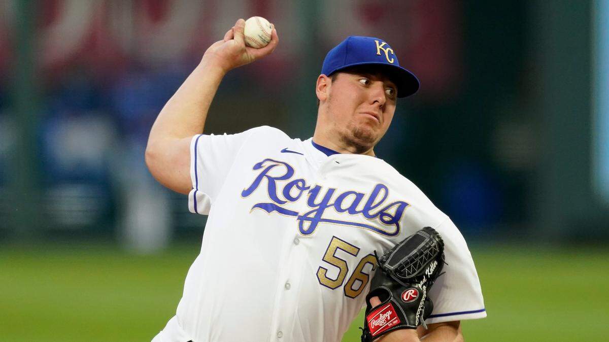 Kansas City Royals starting pitcher Brad Keller throws during the first inning of the team’s baseball game against the Chicago White Sox on Friday, May 7, 2021, in Kansas City, Mo. (AP Photo/Charlie Riedel)
