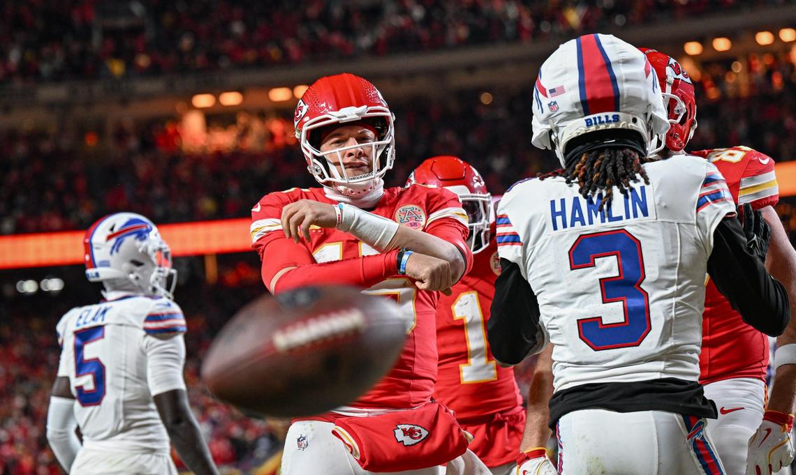 Kansas City Chiefs quarterback Patrick Mahomes (15) throws the ball down after running in for a touchdown in the second quarter against the Buffalo Bills during the AFC Championship Game on Sunday, Jan. 26, 2025, at GEHA Field at Arrowhead Stadium.