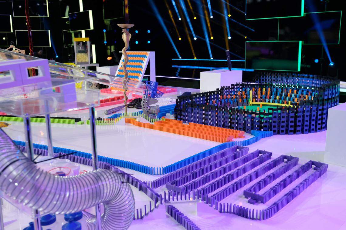 In each episode of “Domino Masters,” four three-member teams compete against one another in themed domino building.
