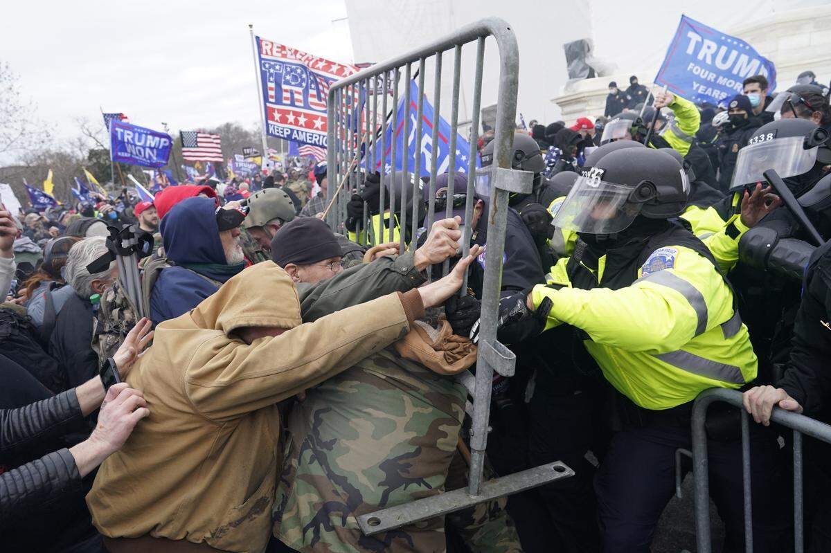 Supporters of former President Donald Trump attack the U.S. Capitol in an effort to overturn the results of the 2020 election on Jan. 6, 2021, in Washington, D.C.