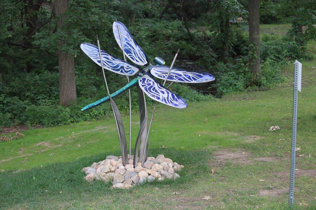 Amie Jacobsen’s dragonfly sculpture, “Spirit of the Brook,” stands near the first hole of Shawnee Mission Park’s Art Nine disc golf course.