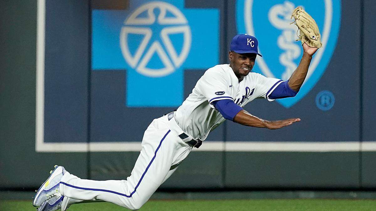 Kansas City Royals center fielder Michael A. Taylor catches a fly ball for the out on Minnesota Twins’ Gary Sanchez during the third inning of a baseball game Tuesday, Sept. 20, 2022, in Kansas City, Mo.