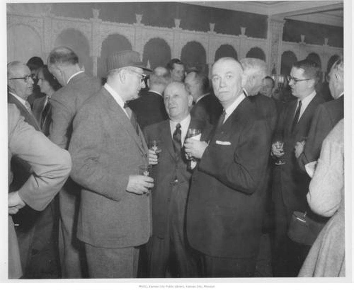 Barney Allis, middle, with City Manager L.P. Cookingham, left, and Nathan Rieger of Mercantile Bank and Trust Co. at a reception for the new Auditorium Plaza Garage in December 1955.