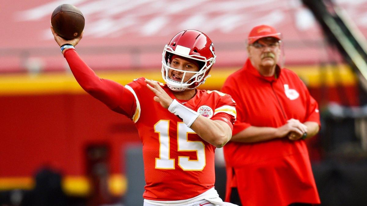 Kansas City Chiefs head coach Andy Reid watches while quarterback Patrick Mahomes warms up before the Chiefs take on the New England Patriots on Monday, October 5, 2020, at Arrowhead Stadium in Kansas City.