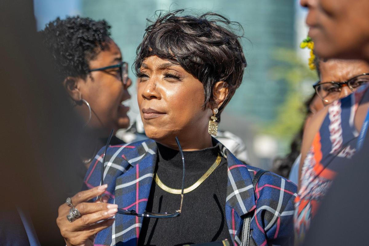 Laurie Bey, mother of Cameron Lamb, walked with supporters after attending an appeals hearing for former Kansas City detective Eric DeValkenaere.