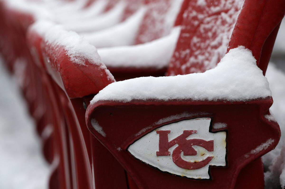 Snow covers seats at Arrowhead Stadium before the an NFL football game between the Kansas City Chiefs and the Indianapolis Colts Sunday, Dec. 22, 2013.