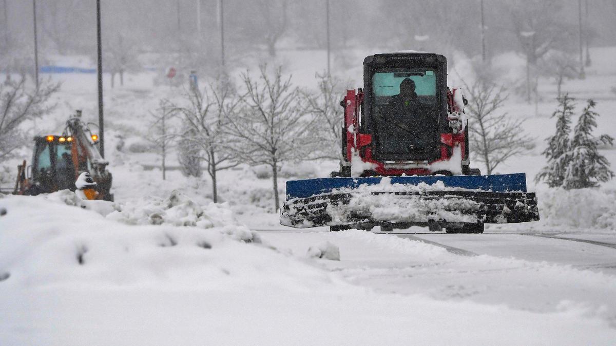 A snow plows cleared snow from the parking lots at Oak Park Mall in Overland Park on Tuesday, Jan. 9, 2024, after a winter storm dumped several inches of snow in the Kansas City area.