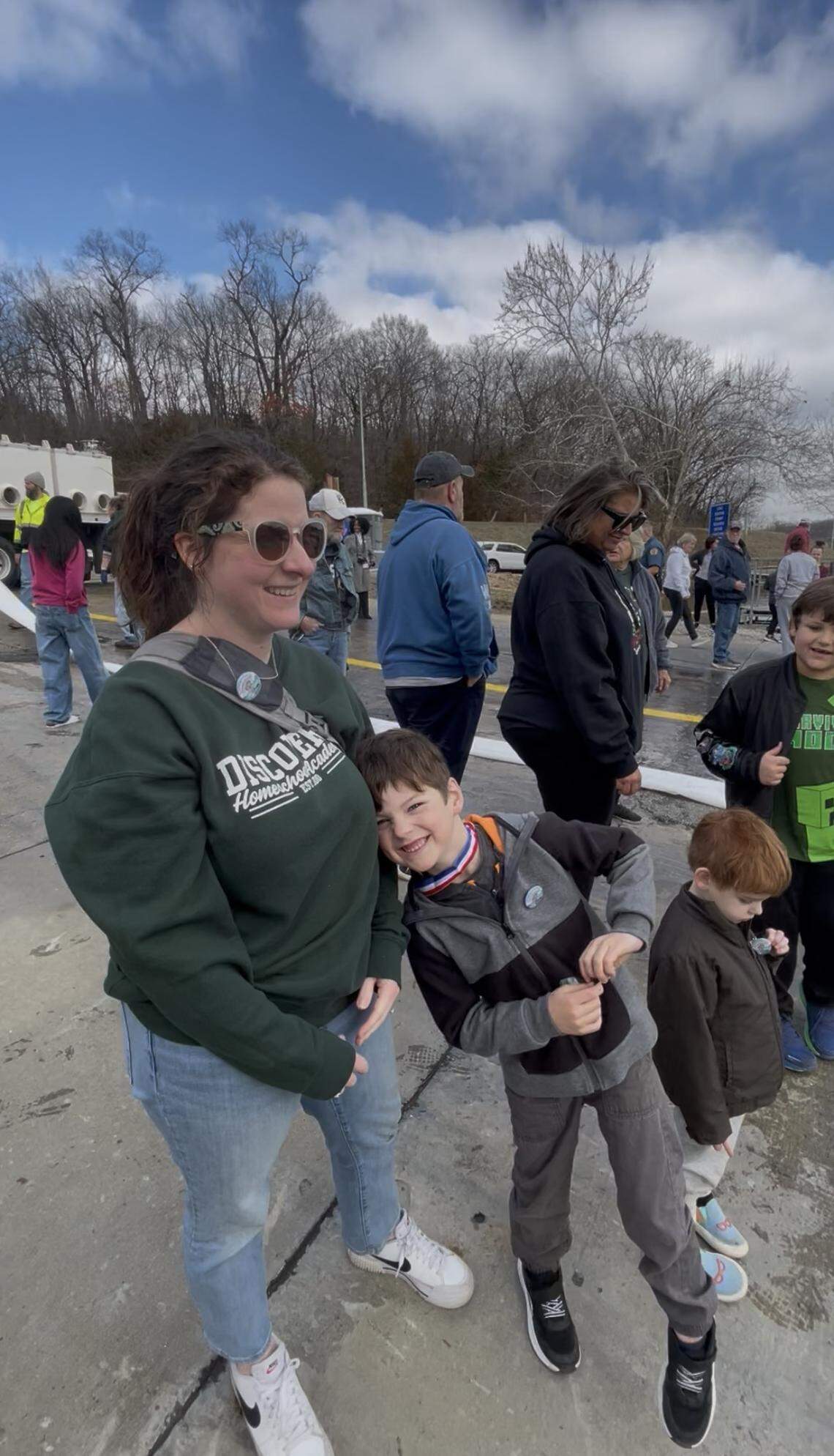 Alex Gibson and her son, Ky, attending an event at Wyandotte County Lake Park on March 5, 2026. They came to watch officials stock the lake with trout ahead of the beginning of fishing season.