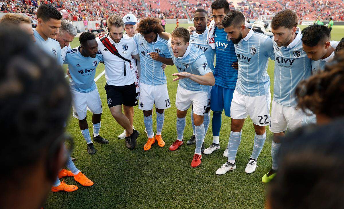Sporting Kansas City defender Matt Besler (5) gets his team pumped up prior to a game against Real Salt Lake at Rio Tinto Stadium on June 6, 2018.