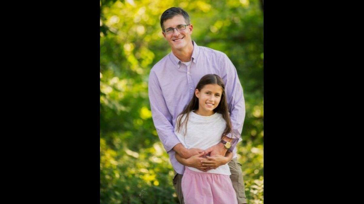 Derek Moffett with his youngest daughter, Catherine
