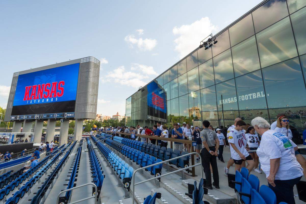 Fans gather inside the newly remodeled David Booth Kansas Memorial Stadium prior to the Jayhawks game vs. the Fresno State Bulldogs on Saturday, Aug. 23, 2025, in Lawrence.