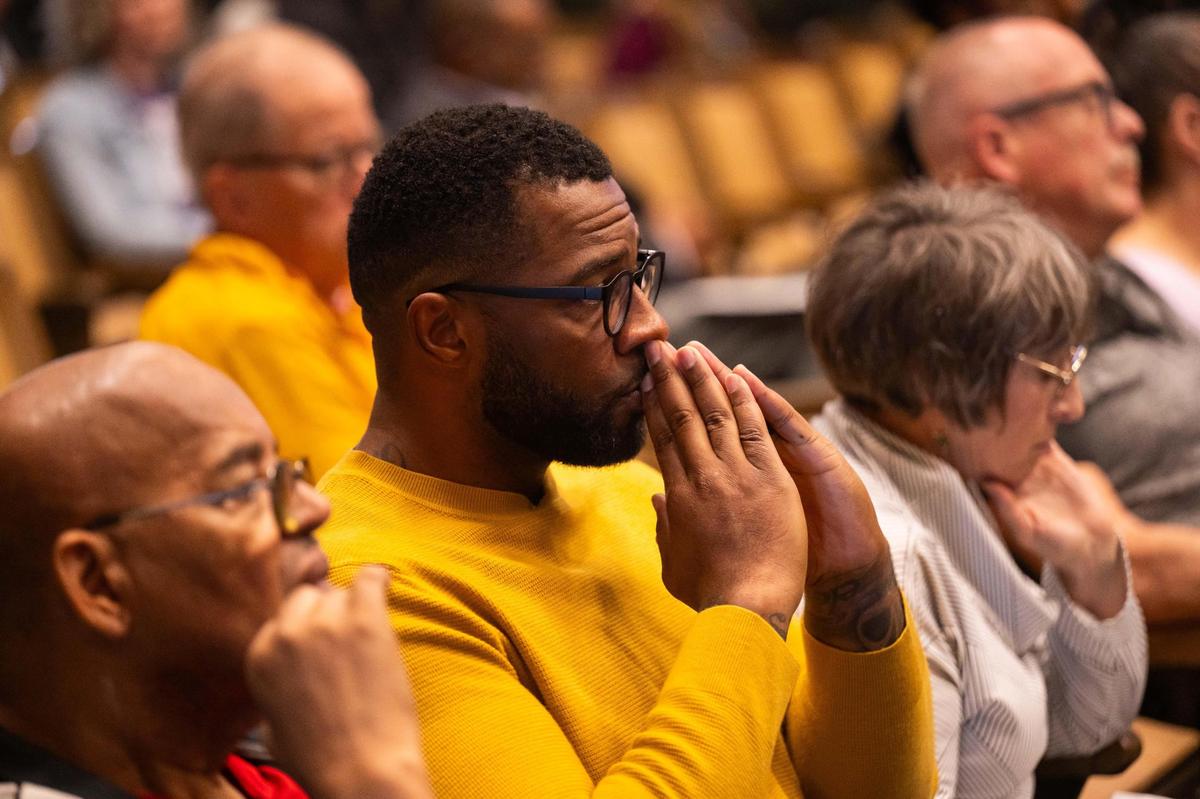 Chris Goode, owner of Ruby Jean’s Juicery, awaits a vote from the city council regarding the renaming of Troost Avenue, at City Hall on Tuesday, May 6, 2025. Goode has been working to get the street renamed for the last three years.