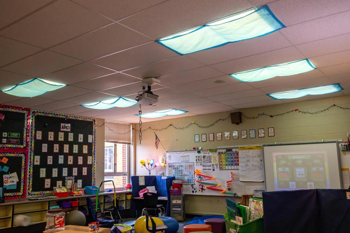 Blue covers dim lights in a special education classroom at Chinn Elementary on Tuesday, March 18, 2025, in Kansas City.