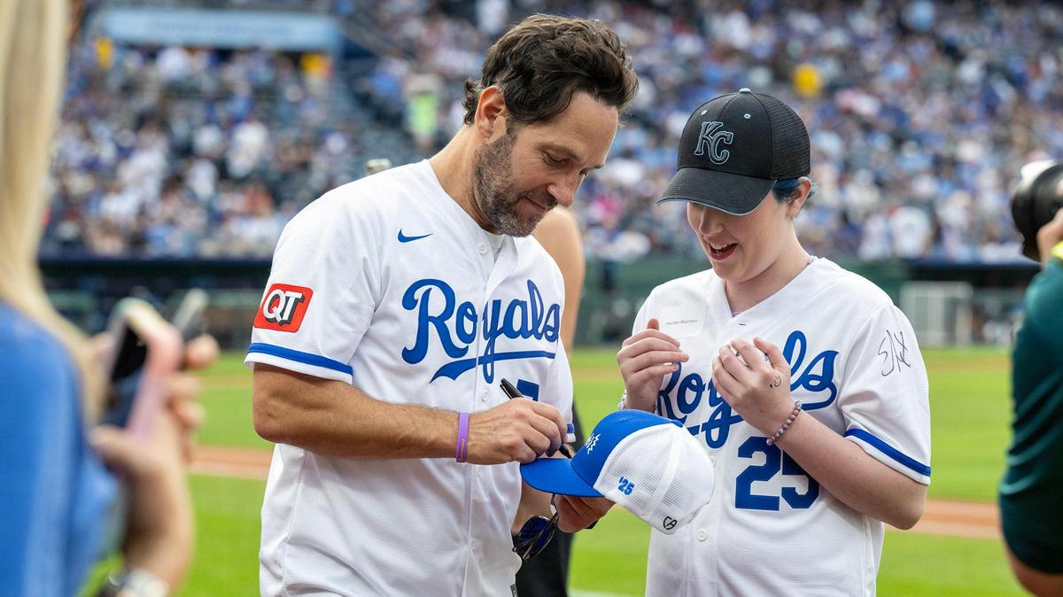 Paul Rudd signs an autograph after the Big Slick Celebrity Softball game on Friday, May 30, 2025, at Kauffman Stadium in Kansas City. He ate at a local Mexican restaurant on Sunday.