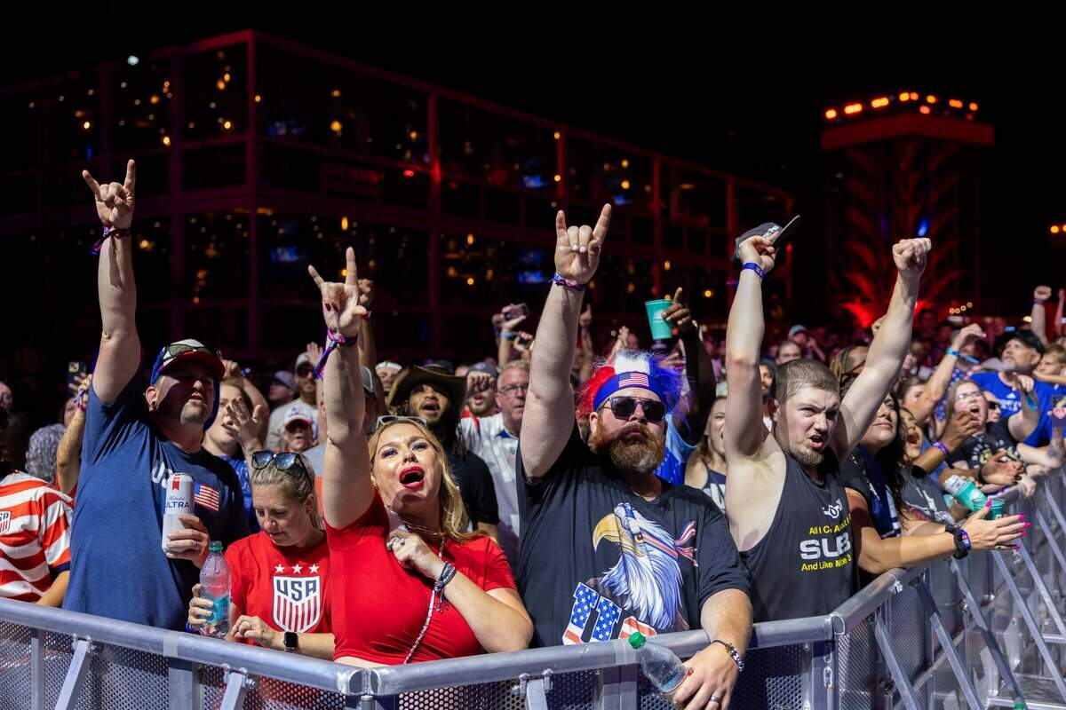 The crowd holds up rockstar hand gestures during Tech N9ne's FIFA Fan Fest concert at Fan Fest  on Friday, June 12, 2026.