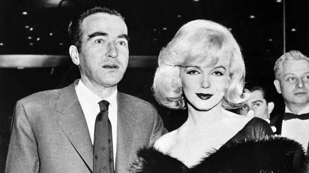 A photo taken on February 3, 1961 shows Marilyn Monroe and Montgomery Clift at the preview of "The Misfits" directed by John Huston, in New York. The HYER cowboy boots Monroe wore in the film are being reissued.