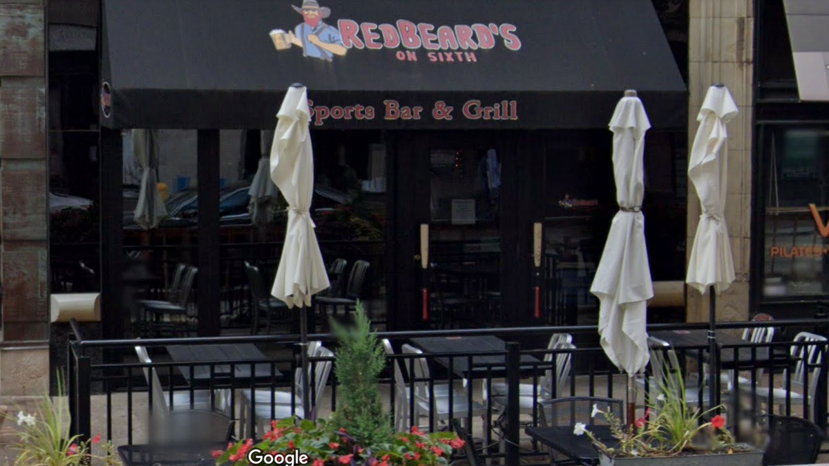 A Redbeard’s Sports Bar and Grill worker was arrested after officials say he spiked a co-worker’s drink with degreaser.