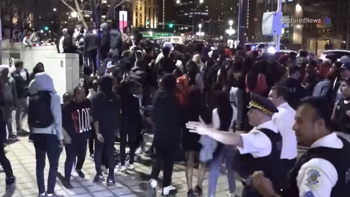 A 14-year-old is accused of shooting a 15-year-old boy during a “teen takeover” in a Chicago street, police said.