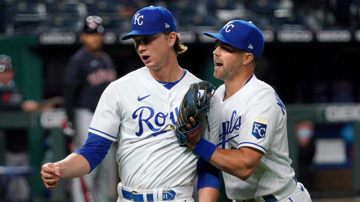 Brady Singer and Whit Merrifield from a 2021 Royals game.