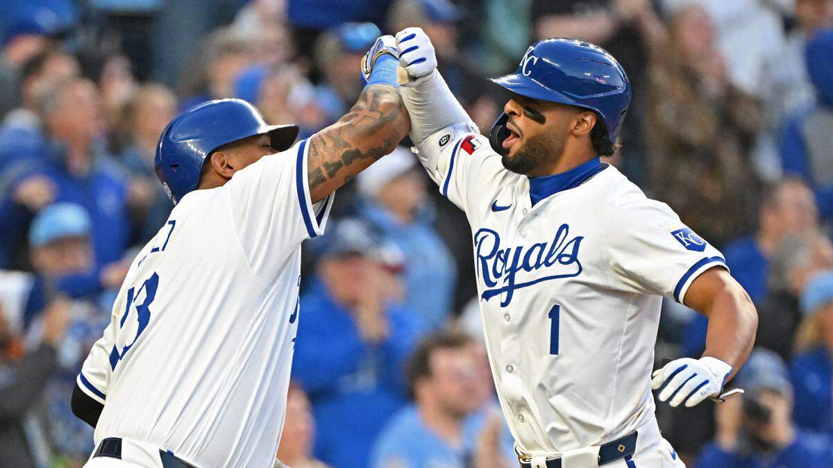 Kansas City Royals left fielder MJ Melendez (1) celebrates with teammate Salvador Perez (13) after hitting a two-run home run in the seventh inning against the Chicago White Sox at Kauffman Stadium on April 6, 2024.